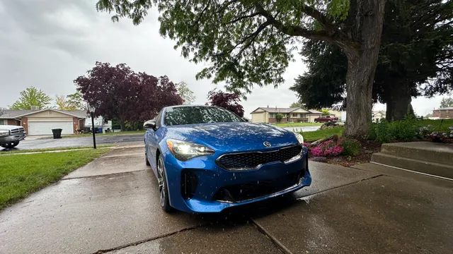 Kia Stinger GT parked in the rain